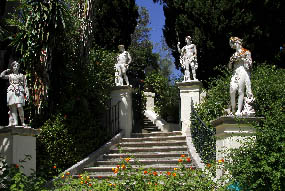The statues at the entrance of Achillion Palace