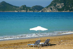 Sunbeds on the beach of Agios Georgios