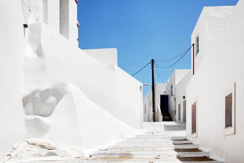 Whitewashed buildings, built close to each other. Tholaria village, Amorgos.