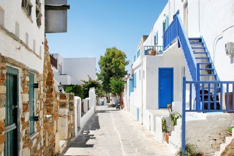 Houses in white and blue colors, built of stone.