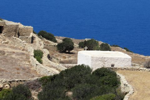 A whitewashed chapel with view to the Aegean sea