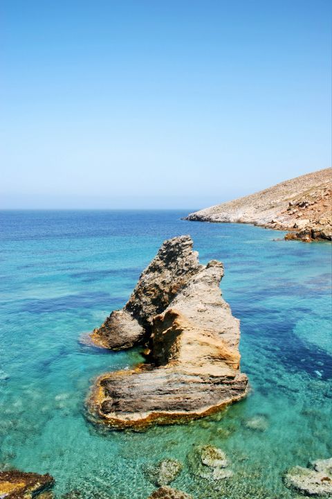 Rock formations and turquoise waters. Koumpara beach, Ios.