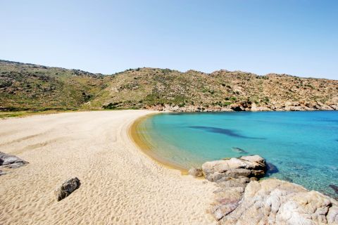 Papa beach, Ios. A quiet place with soft sand, azure waters and mountainsides around it.
