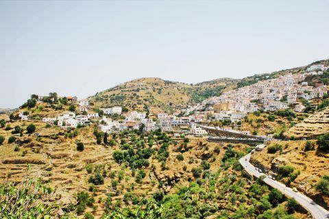 Distant view of Ioulda. Most of the houses are whitewashed and they are built close to each other.