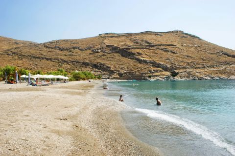 Pises is a beautiful, sandy beach with clear waters, surrounded by slopes.