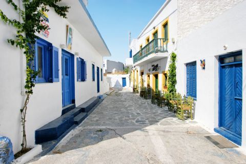 Whitewashed houses with blue details