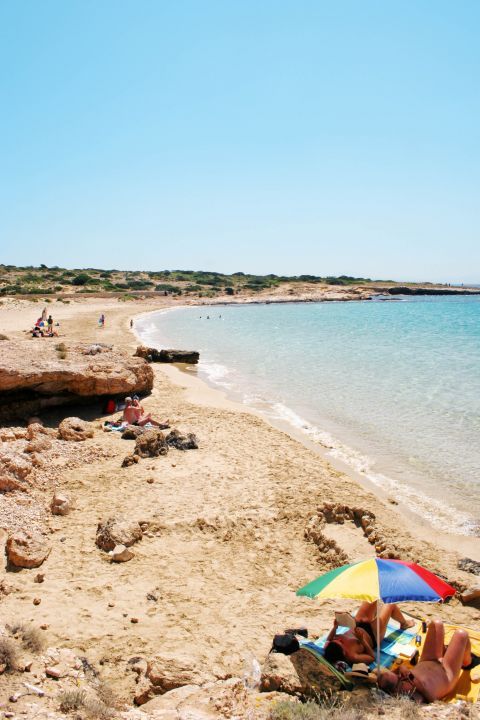 Relaxing moments on the soft sand. The beauties of Koufonisia.