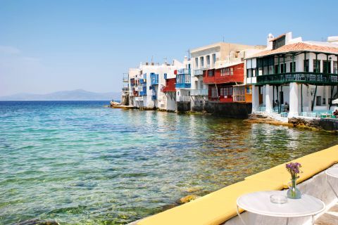 Crystal clear waters and cycladic buildings by the sea in Little Venice