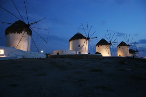 Windmills in night time.