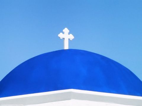 The blue dome of Agios Fokas Church in Akrotiri.