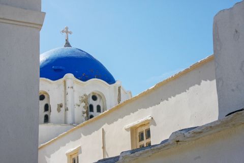 A church with a blue dome in Ktikados village, Tinos.