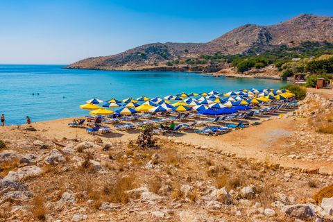 Umbrellas and sun loungers on Pontamos beach, Chalki.