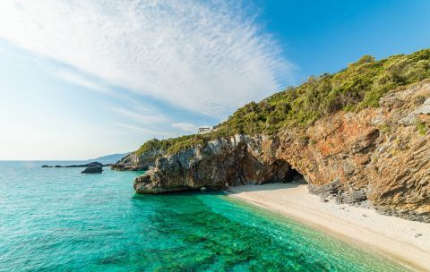 Turquoise waters and rocky spots. Mylopotamos beach, Pelion.