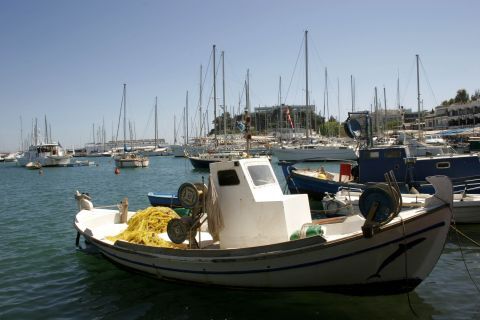 Mikrolimano Harbor: A fishing boat with the yellow nets