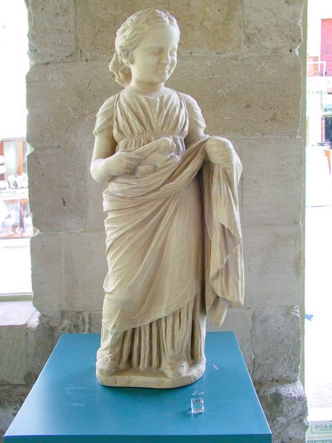 Archaeological Museum: Marble statue of a little girl.