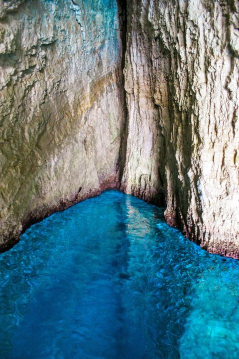 Blue Caves: Azure waters and cliffs.