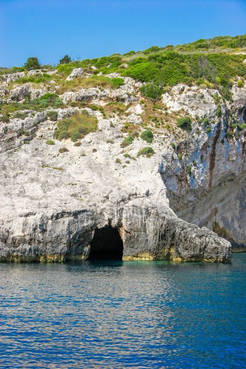 Blue Caves: Whitewashed rock formations.