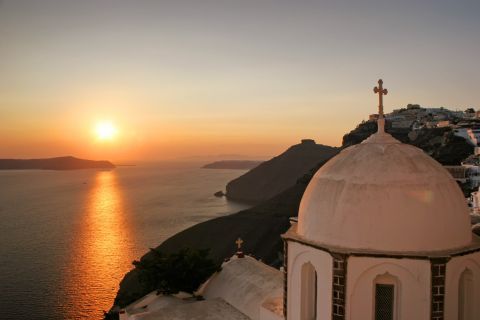 Sunset: Santorini's sunset from a whitewashed Cycladic chapel