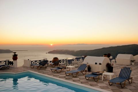 Sunset: The beautiful sunset of Santorini, as seen from a luxurious hotel