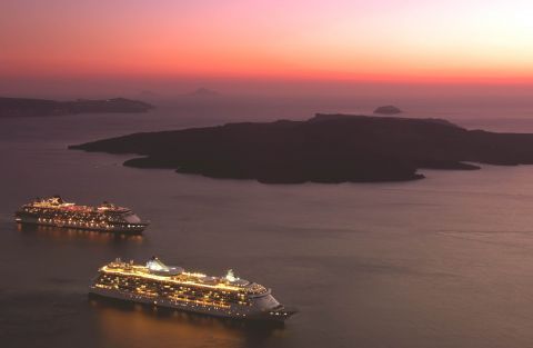 Sunset: Ships travelling on the Aegean sea during sunset