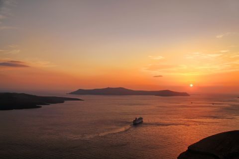 Sunset: Panoramic view of the Aegean sea during sunset, as seen from Santorini