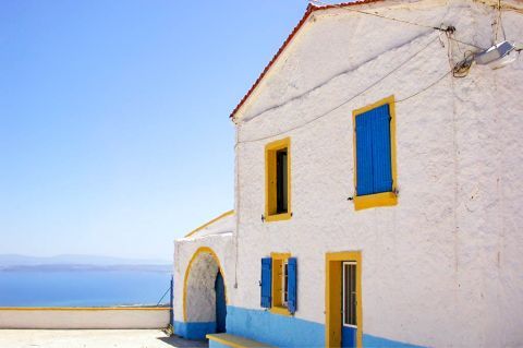 Agios Markos Monastery: The Monastery is painted in white, blue and yellow colors.