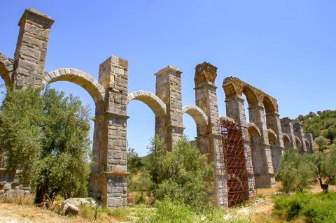 Roman Aqueduct: The impressive Roman Aqueduct rises to 600 meters to the west of Moria, a Lesvian village at 6 km from Mytilene Town.