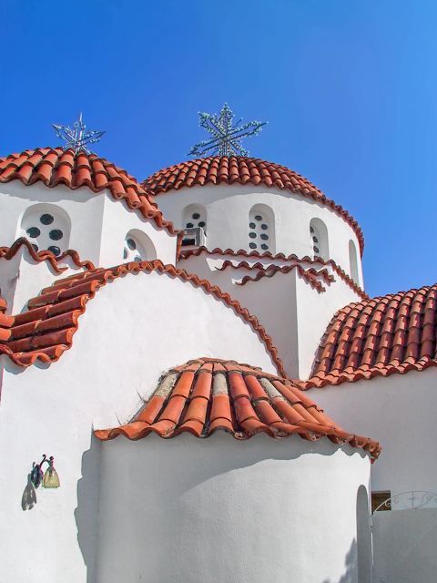 Agios Raphael Monastery: Whitewashed church with ceramic roof tiles.