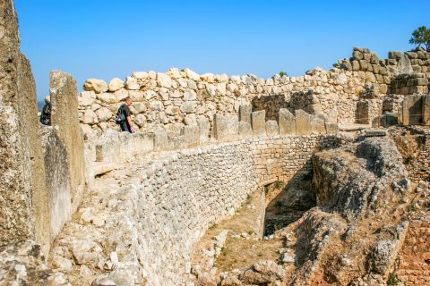 Cyclopean Walls: The characteristic of the Mycenaean walls is that they are made of huge limestone boulders, which have been fitted together rather roughly.