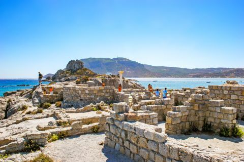 Kefalos beach: Visit the ruins of Agios Stefanos Church.
