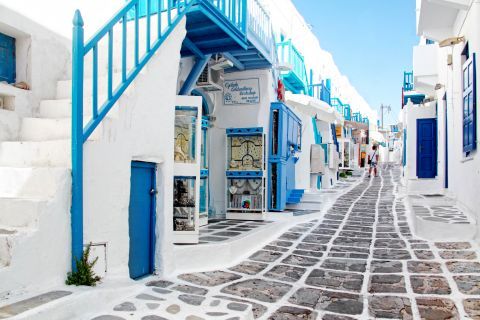 Town: Whitewashed Cycladic house with blue-colored details