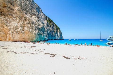 Navagio or Shipwreck: White sand, blue waters and abrupt cliffs.
