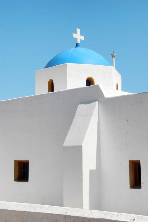 Chora: Whitewashed church with a blue dome.