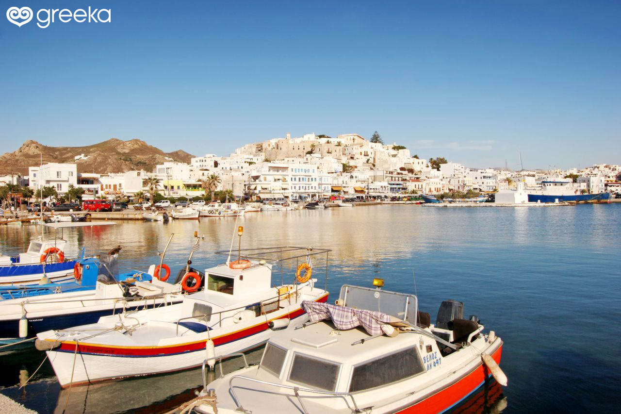 Lovely boats anchored across the port of Naxos Town, with the quaint Kastro standing out in the background