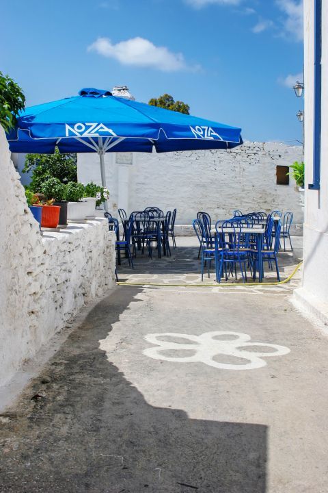 Chora: The outdoor seating of a local cafe
