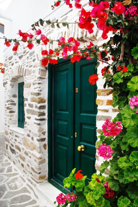 Parikia: A green door of a stone-built house