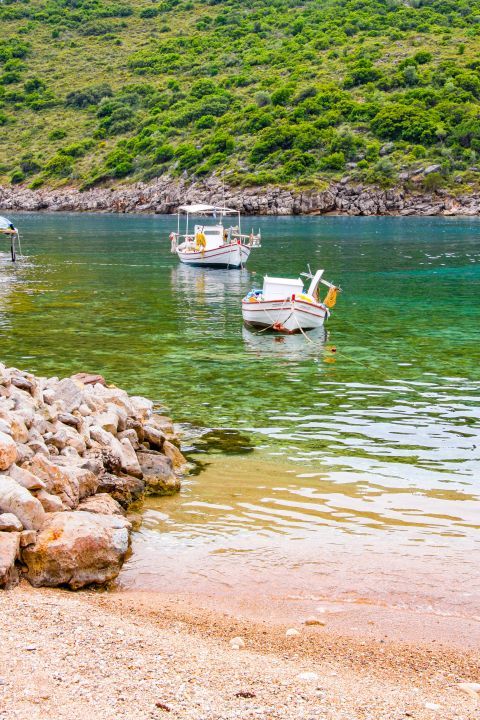 Filiatro: Fishing boats and turquoise waters.