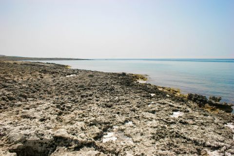Avlemonas beach: Some rocky spots at the seaside.