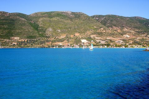 Vassiliki village: Blue waters and verdant hills.