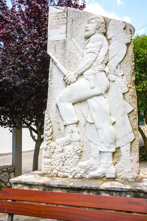 Karia: A war memorial, on which words of the Greek poet Giannis Ritsos are carved.