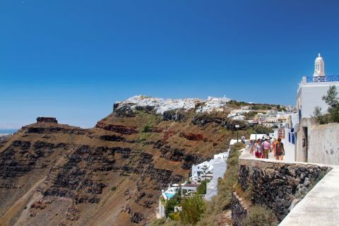 Fira: A beautiful landscape with white houses and rocky parts