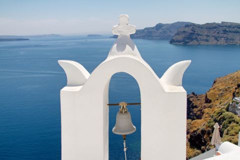Oia: The bellfry of a whitewashed church