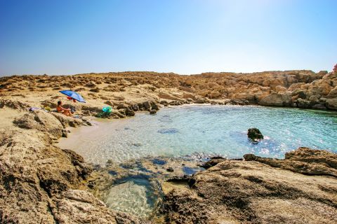 Lefkos beach: A rocky spot with crystal clear waters.