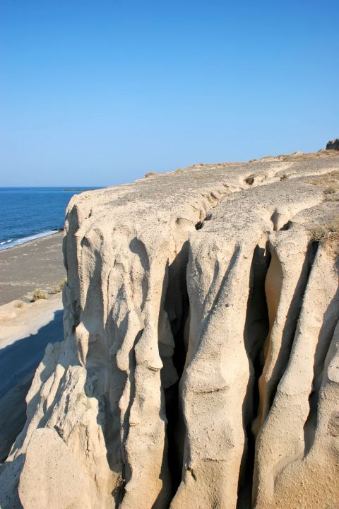 Monolithos: A cliff in Monolithos beach
