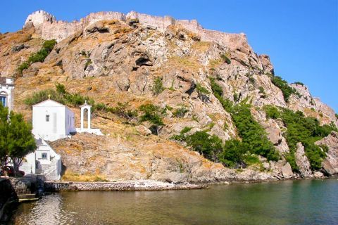 Myrina Romaikos Gialos: A lovely, whitewashed chapel on ton of a hill.