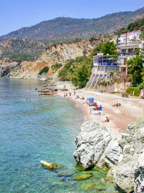 Plomari: Tranquil beach with clean waters.