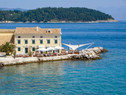 Town: Venetian buildings in Corfu Town overlook the blue waters of the Ionian sea
