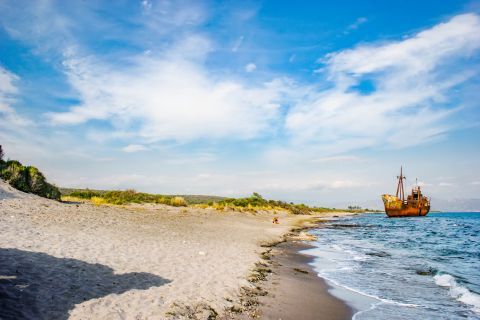 Selinitsa: This beach is popular for the rusty ship that lies ashore.