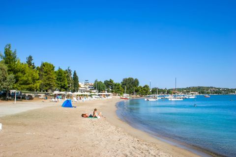 Town beach: Moments of tranquility on the sandy beach of Porto Heli.