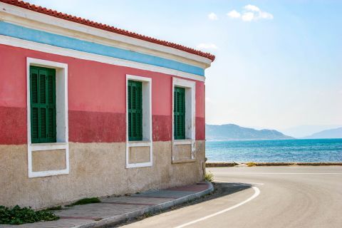 Town: Colorful building in Aegina Town.